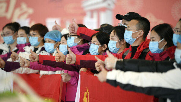 (200128) -- YINCHUAN, Jan. 28, 2020 (Xinhua) -- Members of a medical team are seen on a ceremony before their departure to Wuhan of Hubei Province, at the Hedong International Airport in Yinchuan, northwest China's Ningxia Hui Autonomous Region, Jan. 28, 2020. A team comprised of 135 medical workers from Ningxia left for Wuhan on Tuesday to aid the novel coronavirus control efforts there. (Xinhua/Wang Peng)
